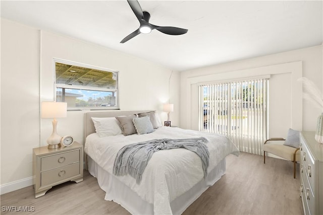 207 Leeland Heights Blvd W, Lehigh Acres, FL 33936 - bedroom featuring multiple windows, light wood finished floors, a ceiling fan, and access to outside