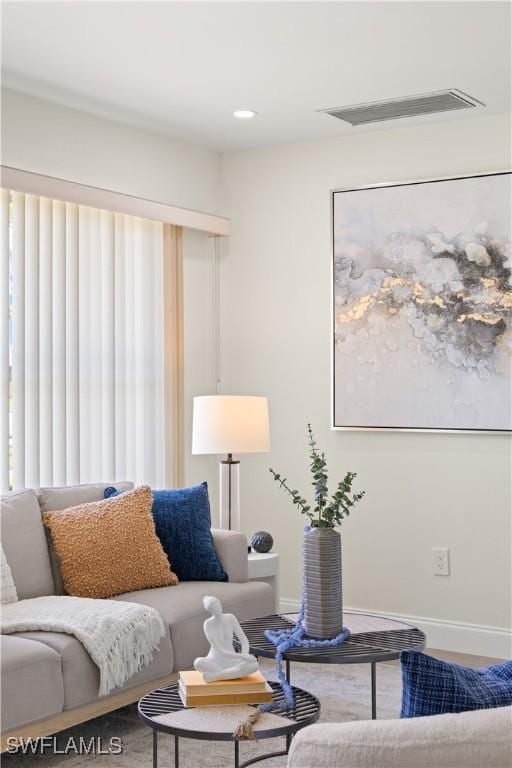 207 Leeland Heights Blvd W, Lehigh Acres, FL 33936 - living area with baseboards and recessed lighting