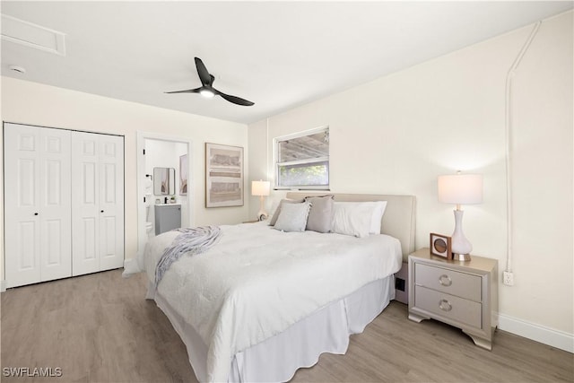 207 Leeland Heights Blvd W, Lehigh Acres, FL 33936 - bedroom with light wood-style floors, connected bathroom, a ceiling fan, and a closet