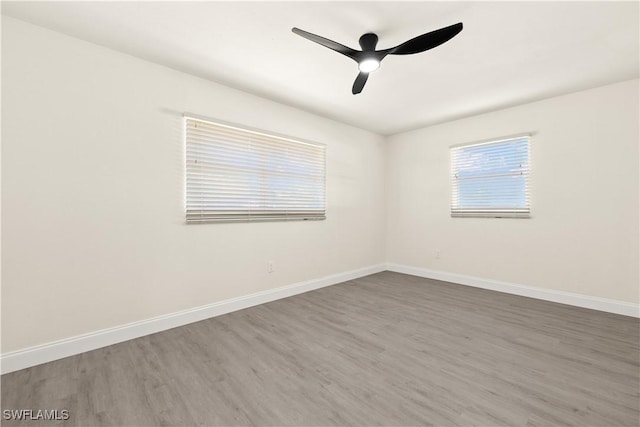 207 Leeland Heights Blvd W, Lehigh Acres, FL 33936 - unfurnished room featuring wood finished floors and ceiling fan