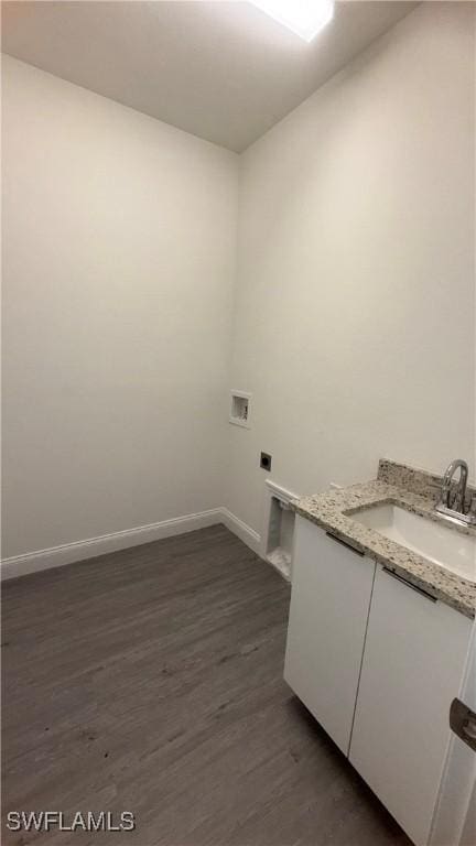 933 Gleason St, Lehigh Acres, FL 33974 - laundry area with hookup for an electric dryer, dark wood-style floors, and hookup for a washing machine