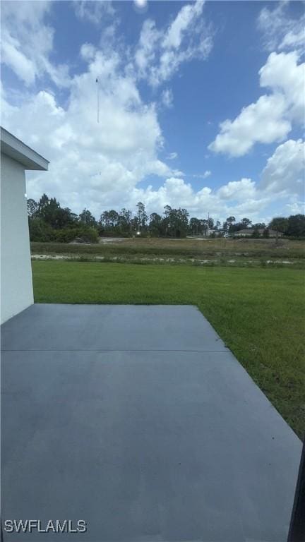 933 Gleason St, Lehigh Acres, FL 33974 - view of patio featuring a view of countryside