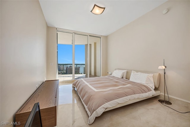 940 Cape Marco Dr Unit 1603, Marco Island, FL 34145 - bedroom featuring access to exterior, floor to ceiling windows, and light tile patterned floors
