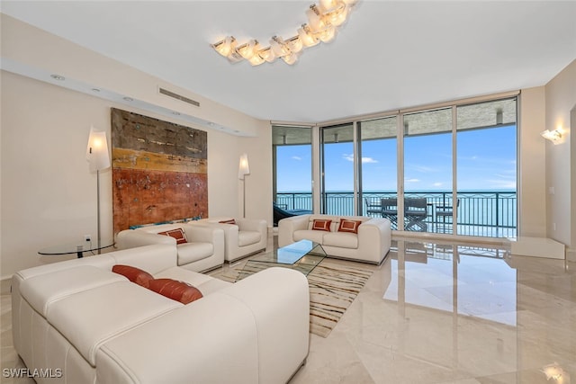 940 Cape Marco Dr Unit 1603, Marco Island, FL 34145 - living area featuring expansive windows and marble tiled floors