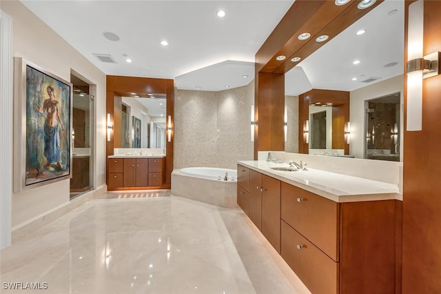 940 Cape Marco Dr Unit 1603, Marco Island, FL 34145 - bathroom featuring a bath, two vanities, a shower stall, recessed lighting, and marble tiled floors