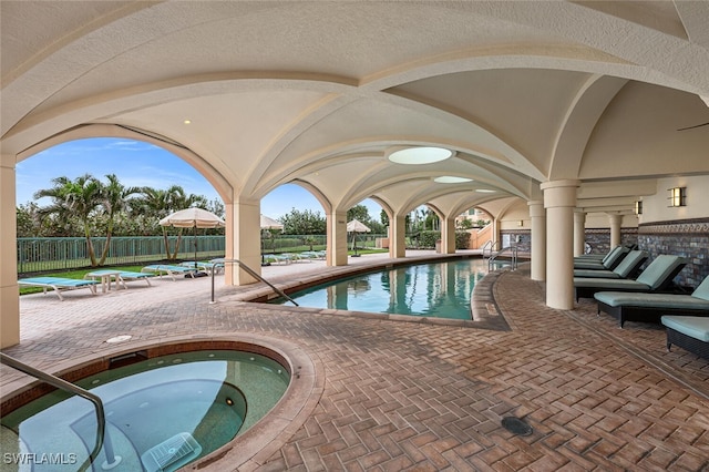 940 Cape Marco Dr Unit 1603, Marco Island, FL 34145 - community pool with a patio area and a community hot tub