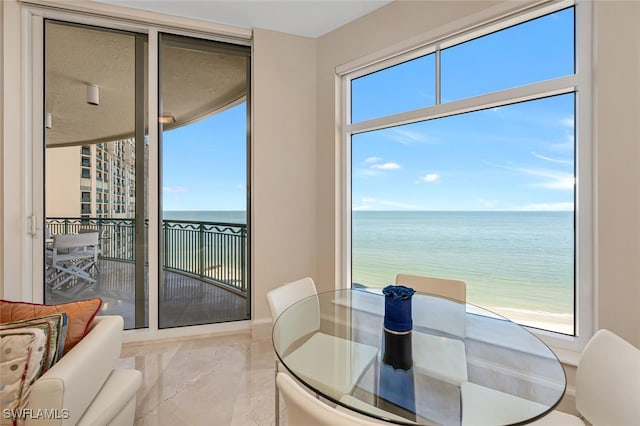 940 Cape Marco Dr Unit 1603, Marco Island, FL 34145 - dining room with marble tiled flooring and a water view