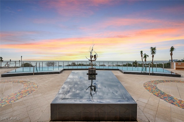 940 Cape Marco Dr Unit 1603, Marco Island, FL 34145 - view of swimming pool with a pool, a water view, and a patio