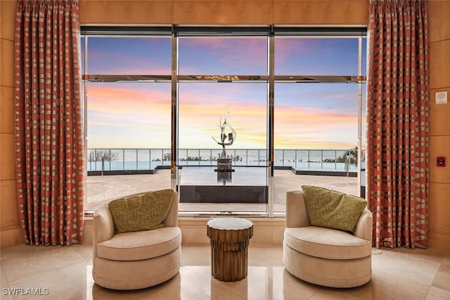 940 Cape Marco Dr Unit 1603, Marco Island, FL 34145 - living area featuring tile patterned flooring and a water view