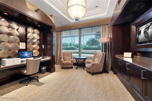 940 Cape Marco Dr Unit 1603, Marco Island, FL 34145 - office area featuring built in desk, a tray ceiling, and carpet flooring