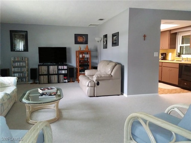 2119 Pellam Blvd, Port Charlotte, FL 33948 - living room featuring light colored carpet and baseboards