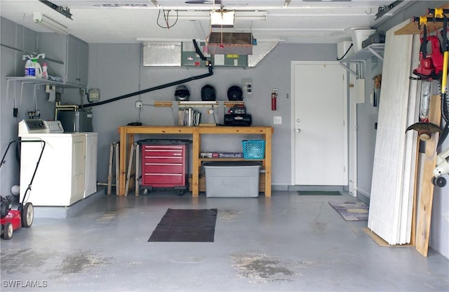 2119 Pellam Blvd, Port Charlotte, FL 33948 - garage featuring washer and clothes dryer and water heater
