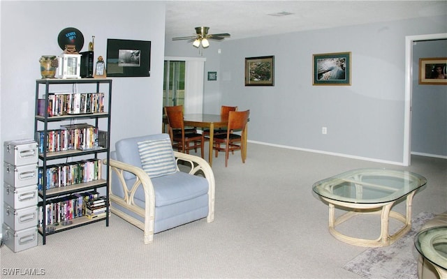 2119 Pellam Blvd, Port Charlotte, FL 33948 - carpeted living area featuring ceiling fan and baseboards