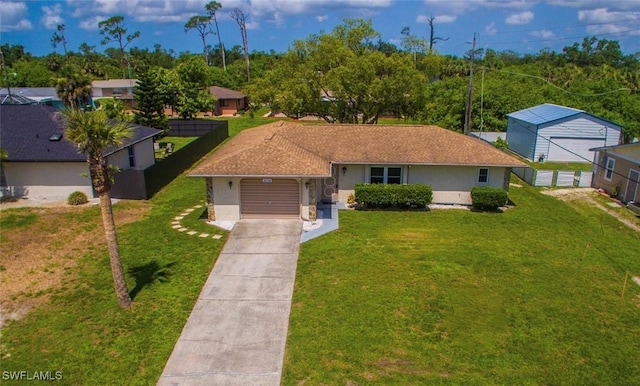 2119 Pellam Blvd, Port Charlotte, FL 33948 - view of front facade featuring concrete driveway, an attached garage, stucco siding, and a front yard