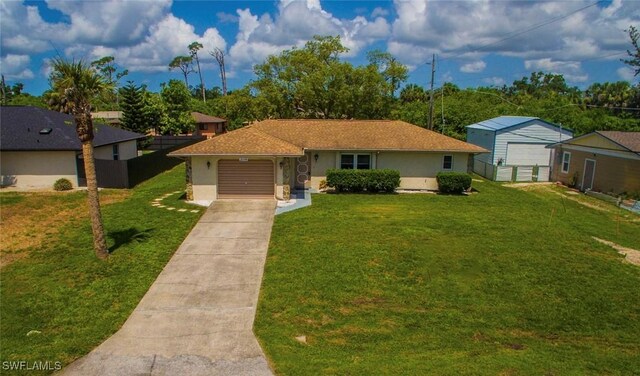 2119 Pellam Blvd, Port Charlotte, FL 33948 - single story home with concrete driveway, an attached garage, and stucco siding
