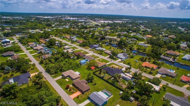 2119 Pellam Blvd, Port Charlotte, FL 33948 - aerial view of property and surrounding area featuring nearby suburban area