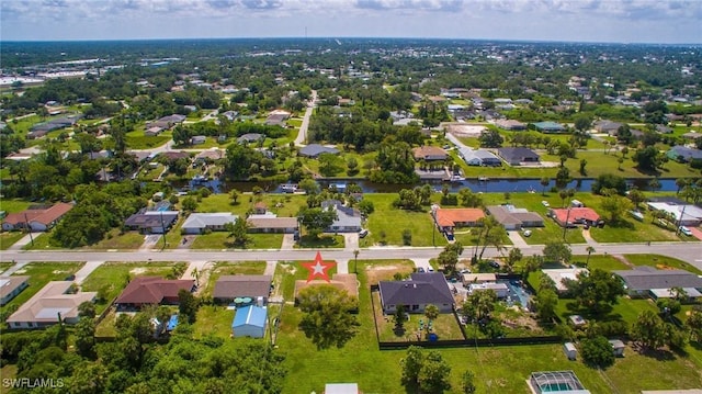 2119 Pellam Blvd, Port Charlotte, FL 33948 - aerial perspective of suburban area featuring a nearby body of water