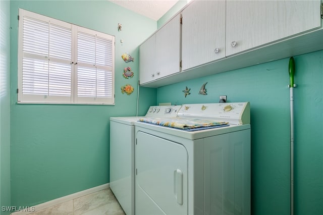 4549 SE 5th Pl Unit 109, Cape Coral, FL 33904 - washroom with cabinet space and washer and dryer