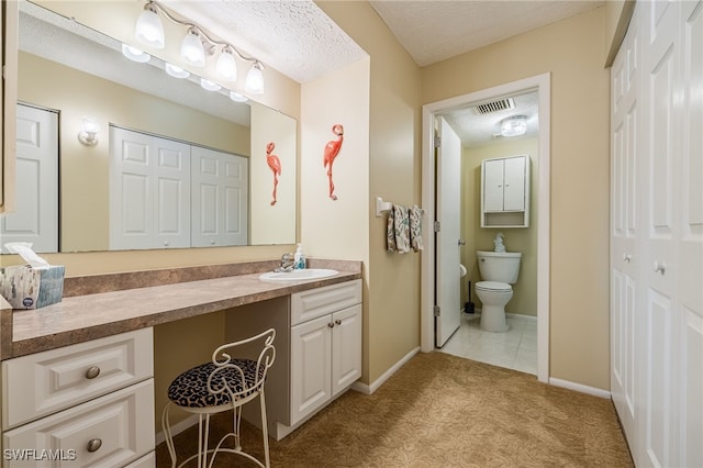 4549 SE 5th Pl Unit 109, Cape Coral, FL 33904 - bathroom featuring vanity, a closet, and a textured ceiling