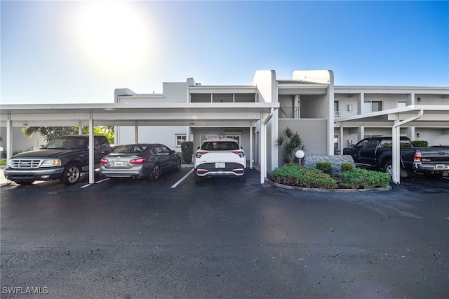 4549 SE 5th Pl Unit 109, Cape Coral, FL 33904 - view of property featuring covered parking
