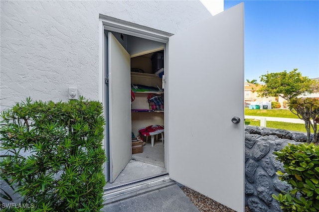 4549 SE 5th Pl Unit 109, Cape Coral, FL 33904 - view of exterior entry featuring stucco siding