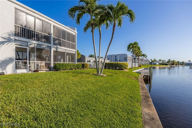 4549 SE 5th Pl Unit 109, Cape Coral, FL 33904 - exterior space with a water view and a yard