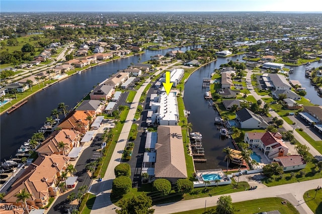 4549 SE 5th Pl Unit 109, Cape Coral, FL 33904 - aerial view of property and surrounding area featuring nearby suburban area