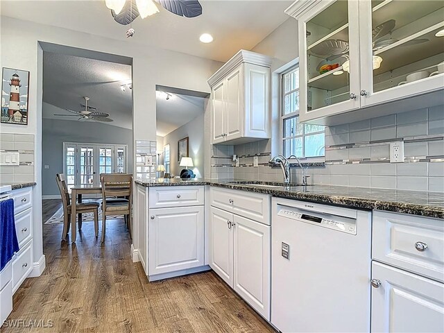 1670 Palo Duro Blvd, North Fort Myers, FL 33917 - kitchen featuring white dishwasher, ceiling fan, dark wood finished floors, white cabinetry, and glass insert cabinets