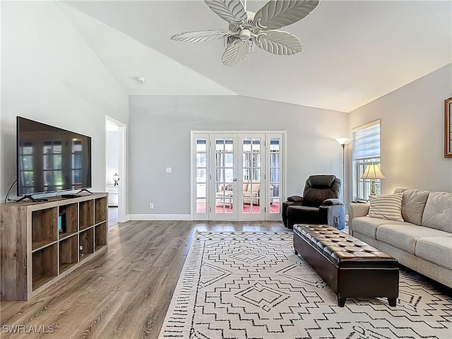 1670 Palo Duro Blvd, North Fort Myers, FL 33917 - living area featuring lofted ceiling, wood finished floors, ceiling fan, and french doors