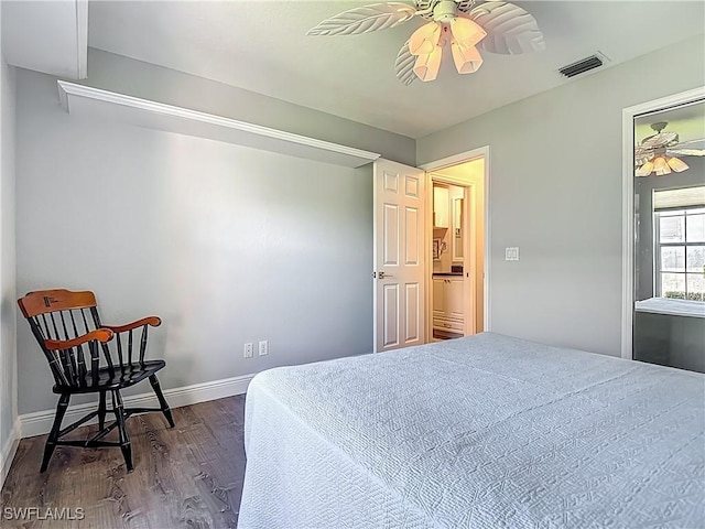 1670 Palo Duro Blvd, North Fort Myers, FL 33917 - bedroom with dark wood finished floors and a ceiling fan