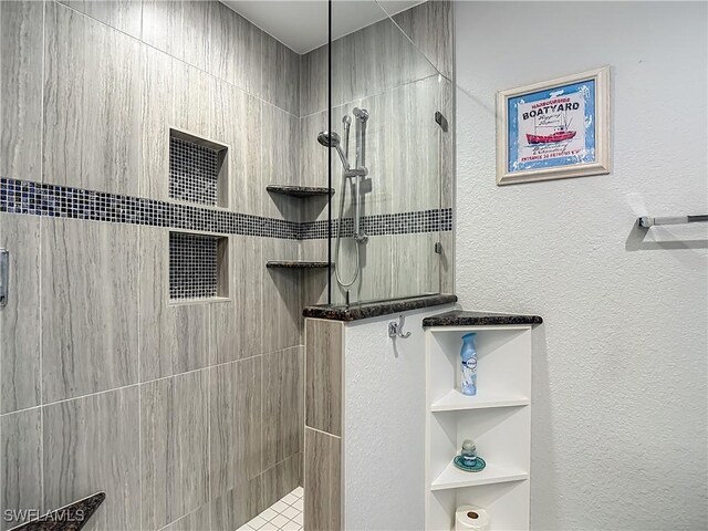 1670 Palo Duro Blvd, North Fort Myers, FL 33917 - bathroom featuring a walk in shower and a textured wall
