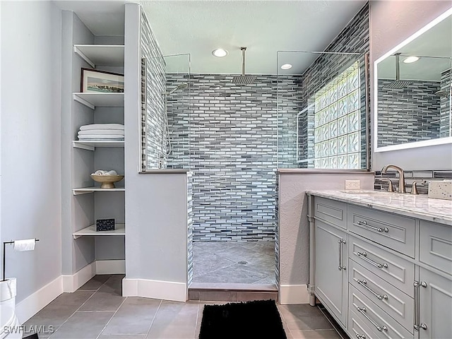 1670 Palo Duro Blvd, North Fort Myers, FL 33917 - full bath featuring a walk in shower, tile patterned floors, vanity, built in features, and recessed lighting