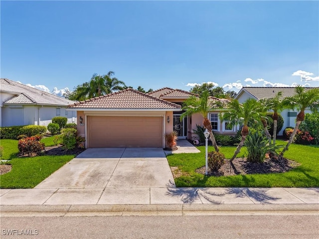 1670 Palo Duro Blvd, North Fort Myers, FL 33917 - view of front facade with an attached garage, stucco siding, concrete driveway, a tile roof, and a front yard