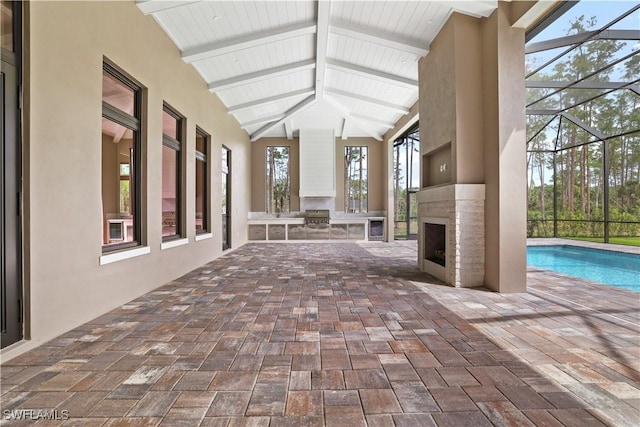 5174 Sycamore Dr, Naples, FL 34119 - view of patio / terrace featuring an outdoor brick fireplace, a lanai, a pool, and area for grilling