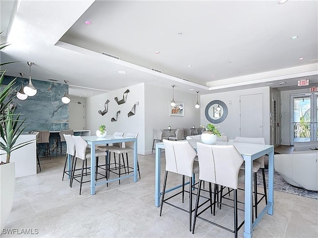 3000 Oasis Grand Blvd Unit 1203, Fort Myers, FL 33916 - dining room featuring a raised ceiling and recessed lighting