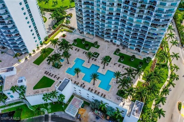 3000 Oasis Grand Blvd Unit 1203, Fort Myers, FL 33916 - drone / aerial view of a pool and apartment complex