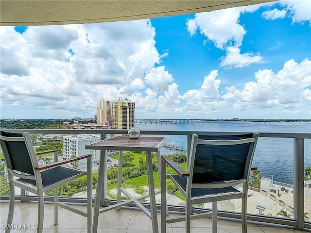 3000 Oasis Grand Blvd Unit 1203, Fort Myers, FL 33916 - balcony with a water view and a view of city