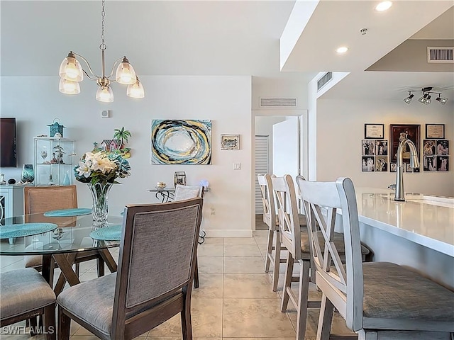 3000 Oasis Grand Blvd Unit 1203, Fort Myers, FL 33916 - dining space featuring light tile patterned floors, a chandelier, and recessed lighting