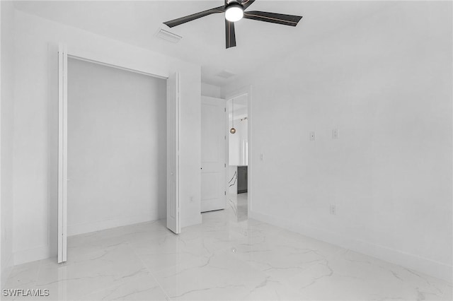 3805 E 16th St, Lehigh Acres, FL 33972 - spare room featuring ceiling fan and marble finish flooring