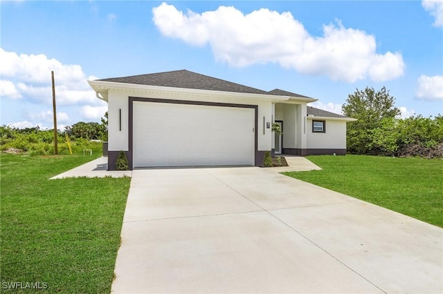 3805 E 16th St, Lehigh Acres, FL 33972 - view of front of property with stucco siding, a front lawn, concrete driveway, and a garage