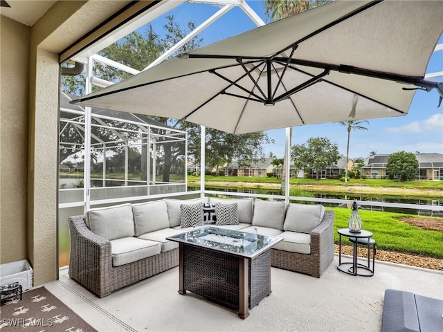 8612 Ibis Cove Cir, Naples, FL 34119 - view of patio / terrace featuring outdoor lounge area, a water view, and a lanai