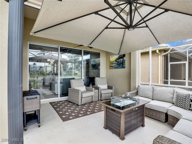 8612 Ibis Cove Cir, Naples, FL 34119 - view of patio / terrace with outdoor lounge area and glass enclosure