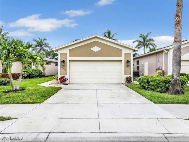 8612 Ibis Cove Cir, Naples, FL 34119 - ranch-style house featuring stucco siding, a front lawn, driveway, and a garage