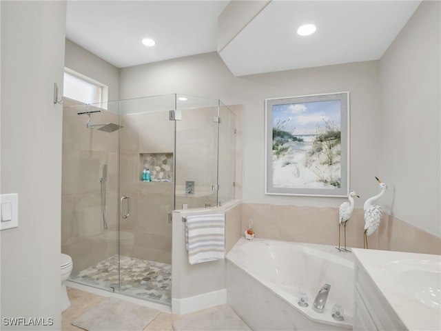 8612 Ibis Cove Cir, Naples, FL 34119 - bathroom with a garden tub, a stall shower, tile patterned flooring, and recessed lighting