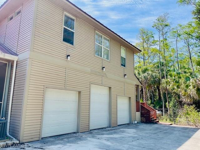 5181 Hickory Wood Dr, Naples, FL 34119 - photo 32