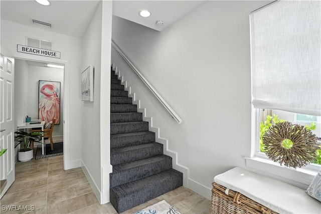 719 Park Ave, Naples, FL 34110 - stairway featuring recessed lighting