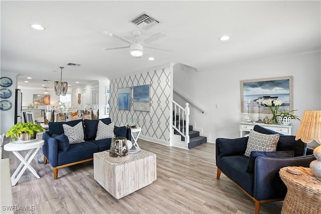 719 Park Ave, Naples, FL 34110 - living room with stairway, crown molding, ceiling fan, recessed lighting, and light wood finished floors