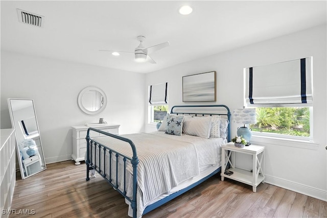 719 Park Ave, Naples, FL 34110 - bedroom with wood finished floors, recessed lighting, and a ceiling fan