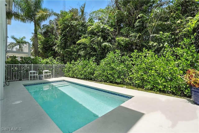 719 Park Ave, Naples, FL 34110 - view of swimming pool with a patio