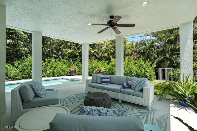 719 Park Ave, Naples, FL 34110 - view of patio featuring an outdoor hangout area, a ceiling fan, and an outdoor pool